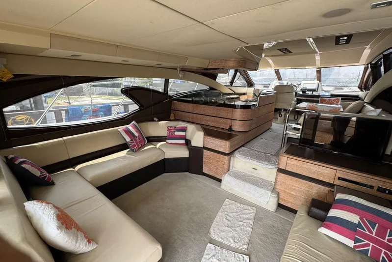  Yacht Photos Pics Luxurious interior of a 2012 Azimut 60 yacht with plush seating and modern design.