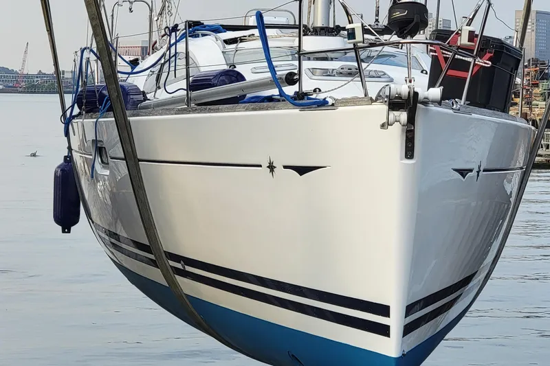  Yacht Photos Pics 2008 Jeanneau Sun Odyssey 42 DS sailboat docked, showcasing sleek design and nautical elegance.