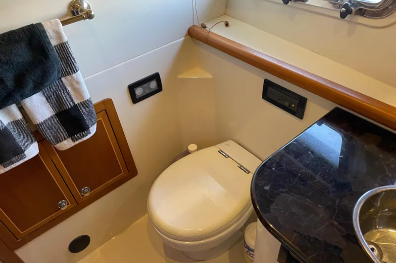  Yacht Photos Pics Bathroom interior of 2007 Fathom Yachts 40, featuring toilet and sink.