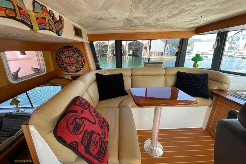  Yacht Photos Pics Luxurious 2007 Fathom Yachts 40 interior with plush seating and artistic decor.