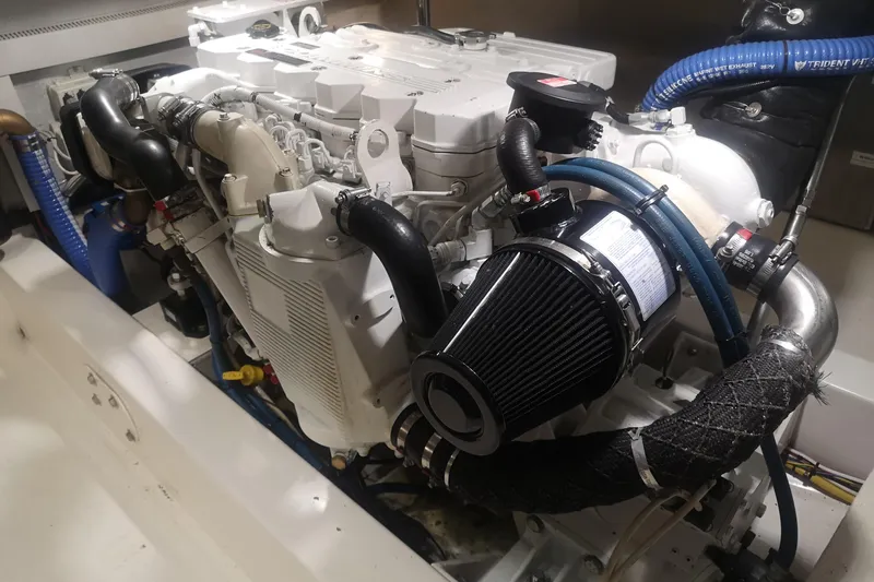  Yacht Photos Pics Engine of a 2007 Fathom Yachts 40, showcasing intricate components and hoses.