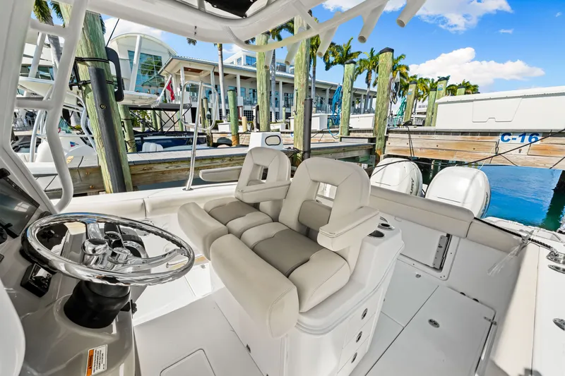  Yacht Photos Pics Interior of a 2017 Boston Whaler 280 Outrage boat at the marina.