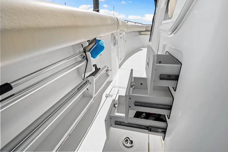  Yacht Photos Pics 2017 Boston Whaler 280 Outrage interior with storage compartments and accessories.