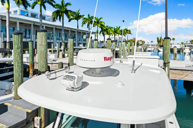  Yacht Photos Pics Boston Whaler 280 Outrage 2017 at marina with Raymarine Quantum radar.