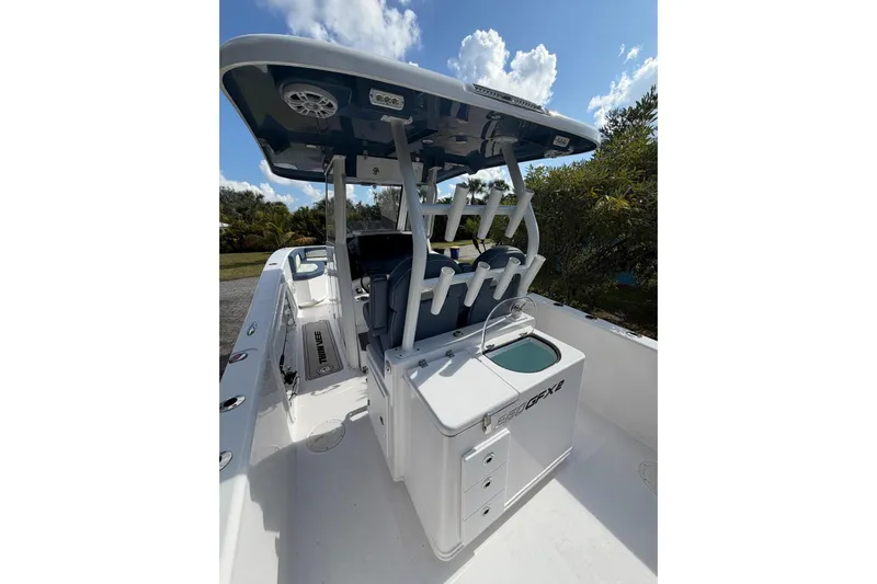  Yacht Photos Pics 2025 Twin Vee 260 GFX2 CC boat interior with rod holders and storage compartments.