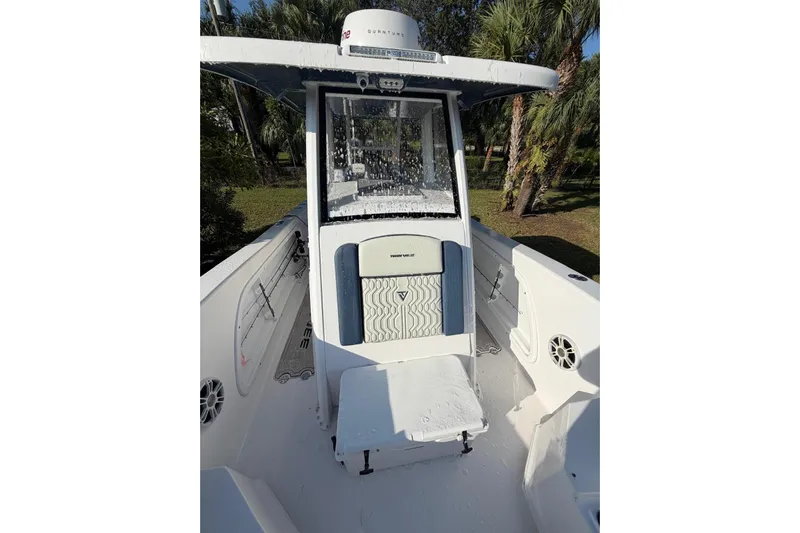  Yacht Photos Pics 2025 Twin Vee 260 GFX2 CC boat interior with modern console and seating.