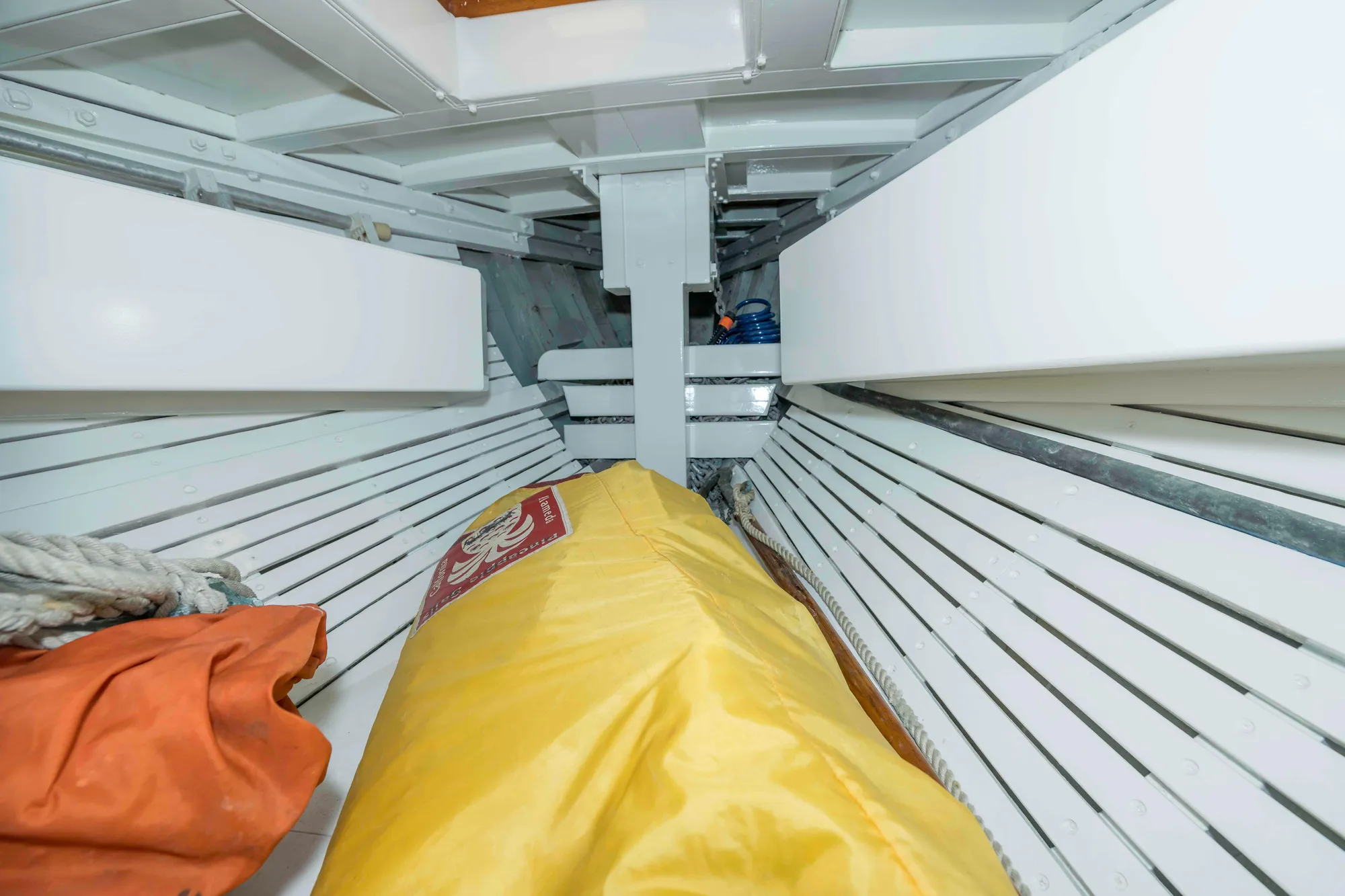 Interior of 1927 Schock Staysail Schooner with storage and equipment.