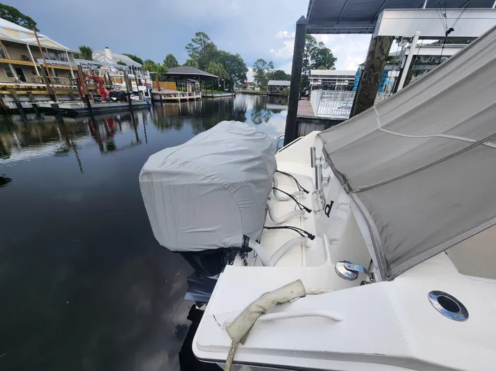  Yacht Photos Pics 2015 Jupiter 41 SB boat docked in a serene marina setting.