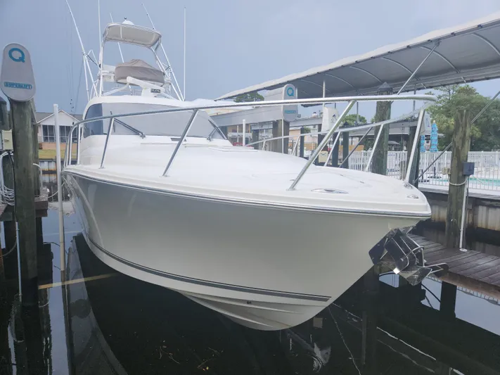  Yacht Photos Pics 2015 Jupiter 41 SB boat docked at marina, showcasing sleek design and spacious deck.