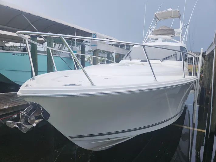  Yacht Photos Pics 2015 Jupiter 41 SB boat docked, showcasing sleek design and polished exterior.