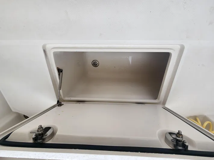  Yacht Photos Pics Open storage compartment on a 2015 Jupiter 41 SB boat.