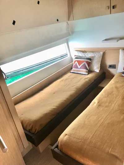  Yacht Photos Pics Interior of 2018 Guy Couach 1900 yacht with twin beds and modern decor.