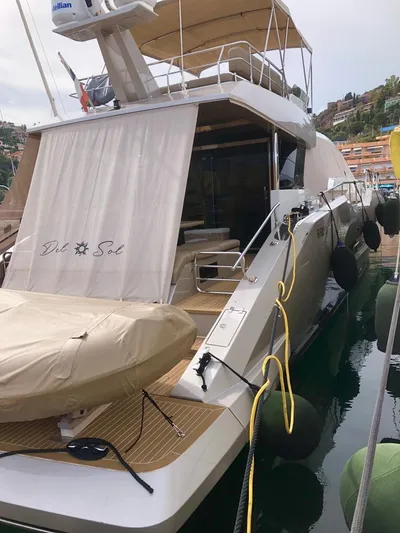  Yacht Photos Pics Luxurious 2018 Guy Couach 1900 yacht docked, featuring elegant design and spacious deck.