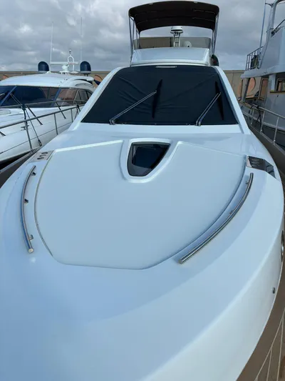  Yacht Photos Pics Luxury Guy Couach 1900 yacht, 2018 model, docked with sleek design and modern features.
