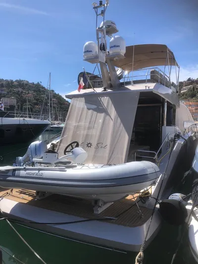  Yacht Photos Pics Luxury Guy Couach 1900 yacht, 2018 model, docked with inflatable boat on deck.