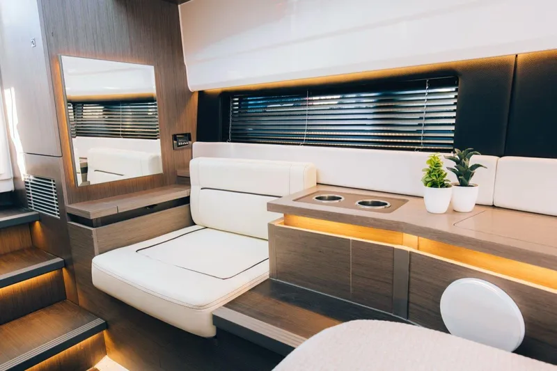  Yacht Photos Pics Luxurious interior of 2023 Wellcraft 355 yacht with modern seating and decor.