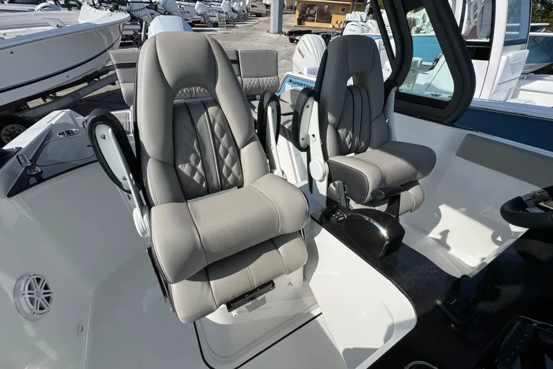  Yacht Photos Pics Luxury seating on 2026 Monterey Elite 25 OB boat, featuring modern design and comfort.