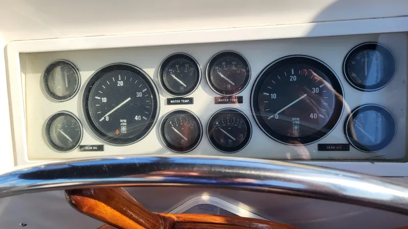 Maia Yacht Photos Pics Dashboard of a 1989 Grand Banks 42 Classic boat with various gauges and dials.