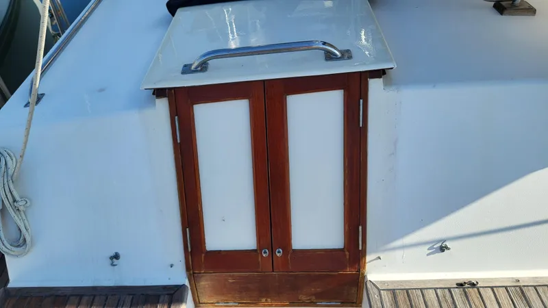 Maia Yacht Photos Pics Wooden hatch on 1989 Grand Banks 42 Classic yacht deck.