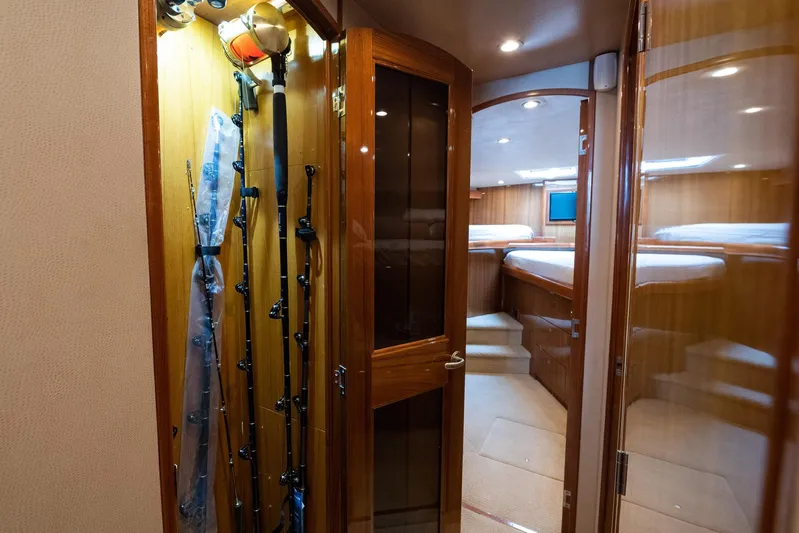 Defiance Yacht Photos Pics 2007 Viking 64 Convertible yacht interior with fishing rod storage and cozy cabin.