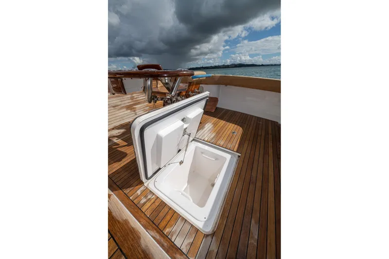Defiance Yacht Photos Pics Open hatch on 2007 Viking 64 Convertible yacht deck under cloudy sky.