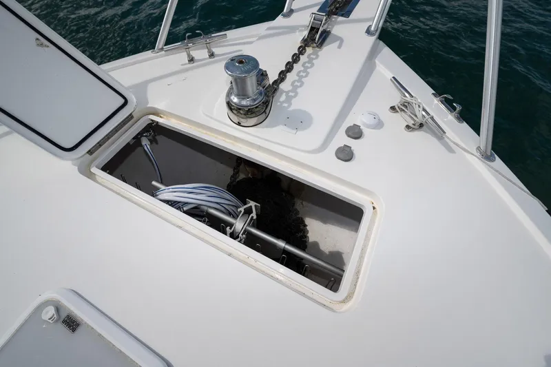 Defiance Yacht Photos Pics Bow of 2007 Viking 64 Convertible yacht with anchor storage compartment open.