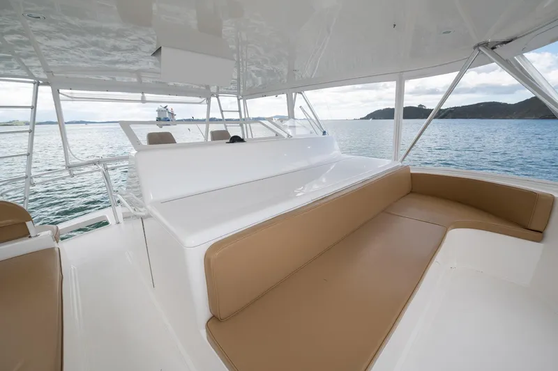 Defiance Yacht Photos Pics Spacious seating area on 2007 Viking 64 Convertible yacht, overlooking serene ocean view.