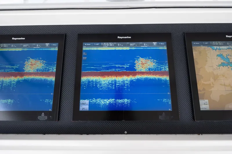 Defiance Yacht Photos Pics Raymarine navigation displays on a 2007 Viking 64 Convertible yacht dashboard.