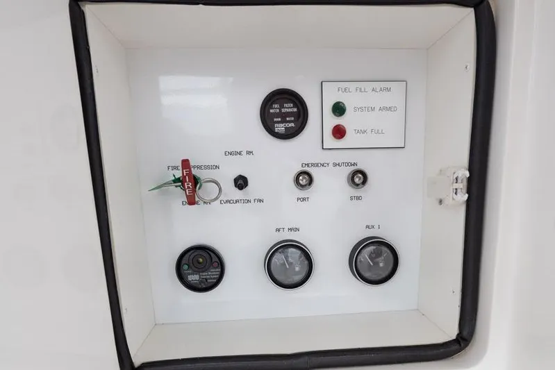 Defiance Yacht Photos Pics Control panel of a 2007 Viking 64 Convertible yacht with gauges and switches.