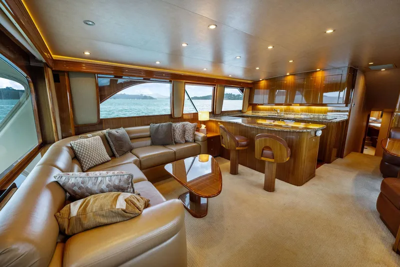 Defiance Yacht Photos Pics Luxurious interior of a 2007 Viking 64 Convertible yacht with elegant seating and dining area.