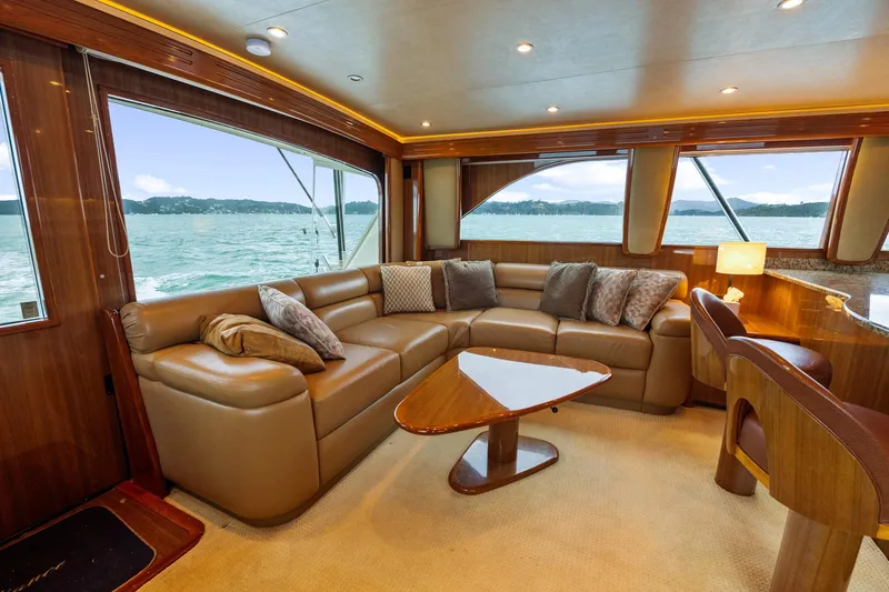 Defiance Yacht Photos Pics Luxurious interior of 2007 Viking 64 Convertible yacht with leather seating and ocean view.