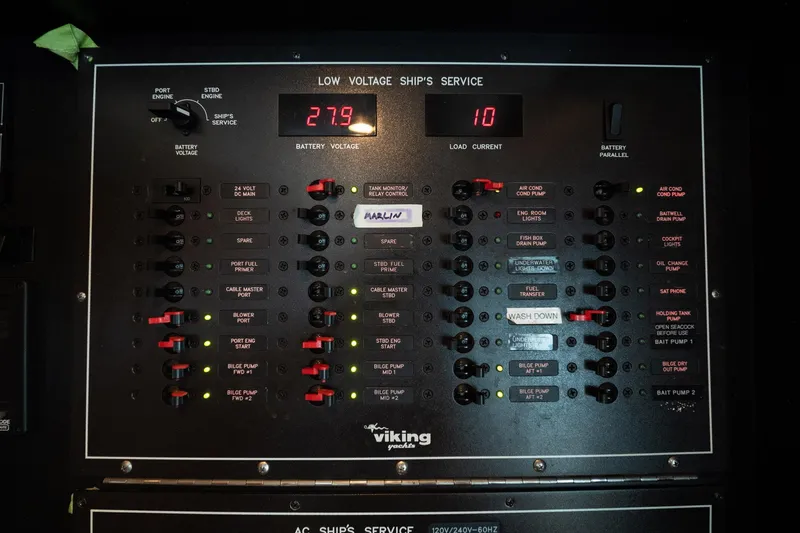 Defiance Yacht Photos Pics Control panel of a 2007 Viking 64 Convertible yacht, displaying battery voltage and load current.