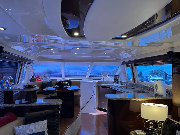  Yacht Photos Pics Luxurious interior of a 2008 Sea Ray 58 Sedan yacht with modern furnishings and ambient lighting.