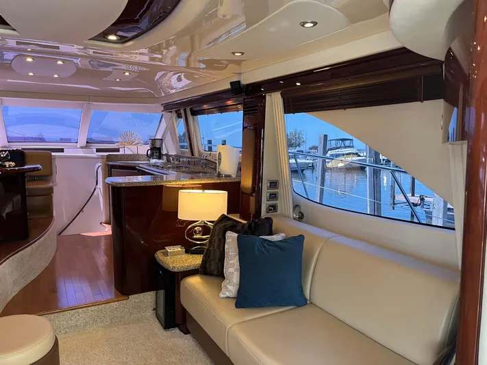  Yacht Photos Pics Luxurious interior of 2008 Sea Ray 58 Sedan yacht with elegant seating and modern amenities.