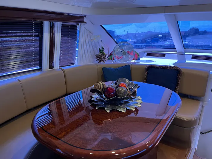 Yacht Photos Pics Luxurious interior of a 2008 Sea Ray 58 Sedan yacht with elegant dining area.