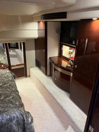  Yacht Photos Pics Luxurious interior of 2008 Sea Ray 58 Sedan yacht with elegant wood finishes.