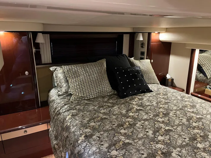  Yacht Photos Pics Luxurious bedroom interior of 2008 Sea Ray 58 Sedan yacht with elegant bedding.