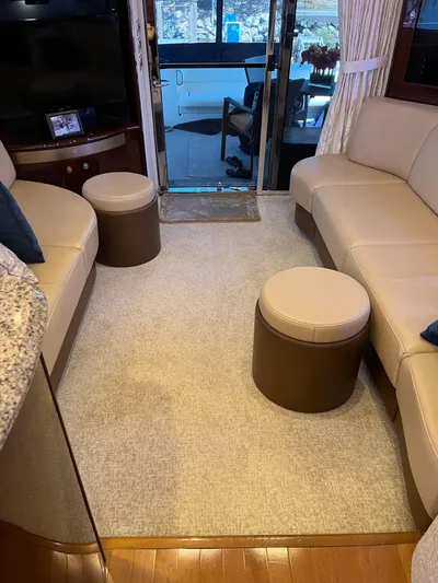  Yacht Photos Pics Interior of a 2008 Sea Ray 58 Sedan yacht with beige seating and modern decor.