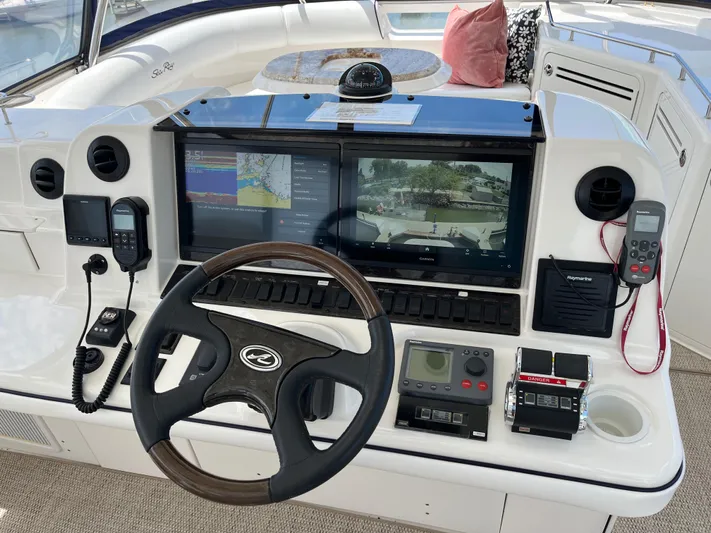  Yacht Photos Pics Control panel of a 2008 Sea Ray 58 Sedan yacht with navigation equipment.