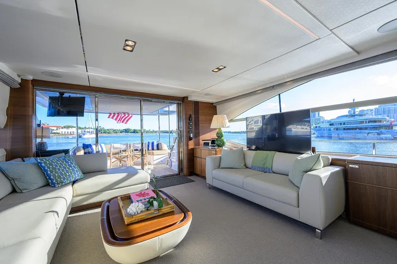 Janie II Yacht Photos Pics Luxurious interior of 2021 Princess Y78 yacht with waterfront view and elegant furnishings.