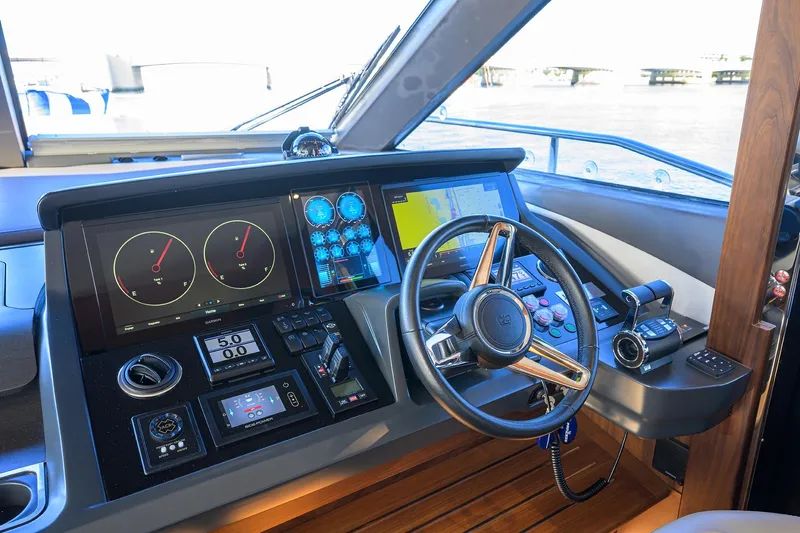 Janie II Yacht Photos Pics Luxurious 2021 Princess Y78 yacht helm with advanced navigation controls and sleek design.