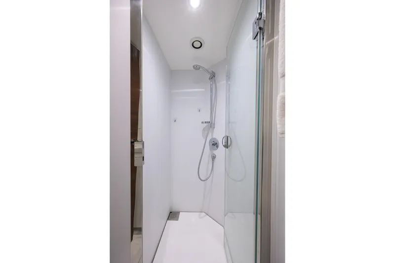 Janie II Yacht Photos Pics Modern shower in 2021 Princess Y78 yacht, featuring sleek design and glass door.