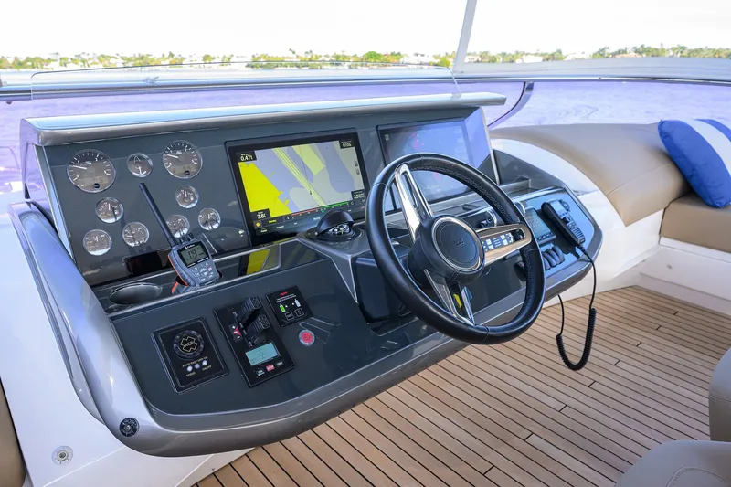 Janie II Yacht Photos Pics Helm of 2021 Princess Y78 yacht with navigation controls and display.