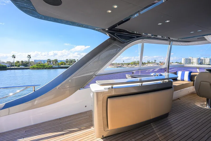 Janie II Yacht Photos Pics Luxurious 2021 Princess Y78 yacht interior with scenic waterfront view.