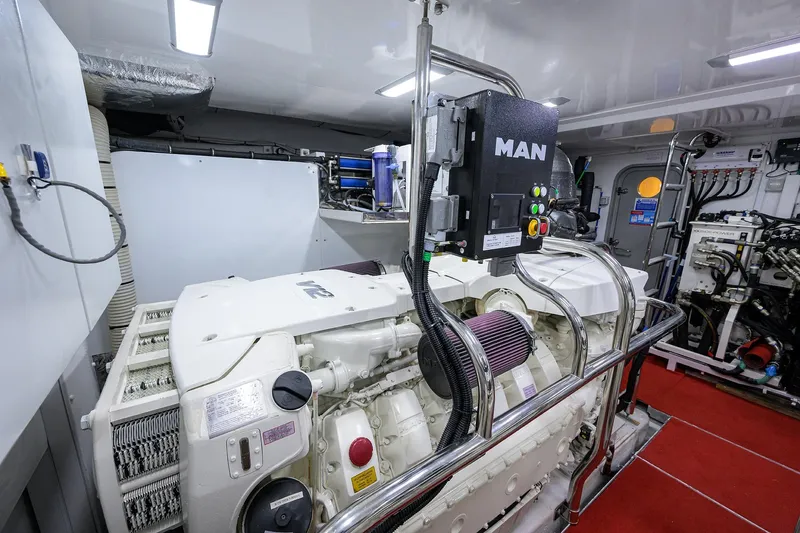 Janie II Yacht Photos Pics Engine room of 2021 Princess Y78 yacht featuring MAN engine components.