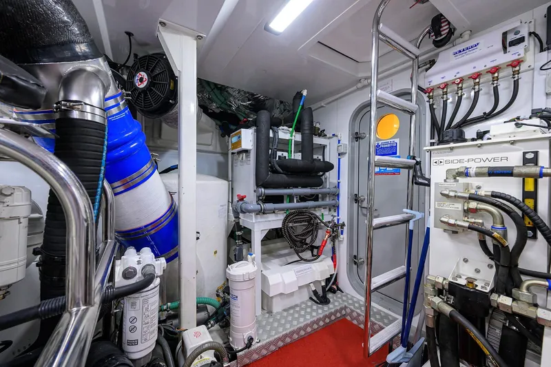 Janie II Yacht Photos Pics Engine room of 2021 Princess Y78 yacht with advanced mechanical systems and equipment.