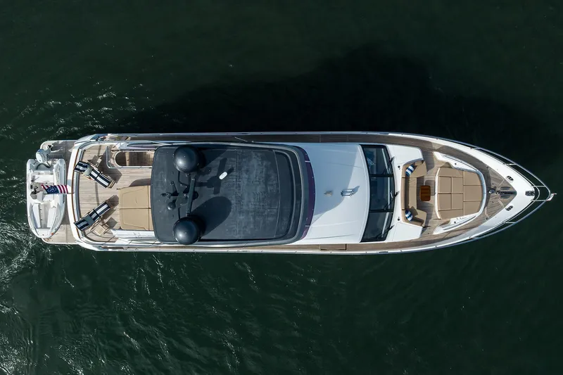 Janie II Yacht Photos Pics Overhead view of 2021 Princess Y78 yacht on water, showcasing sleek design and spacious deck.