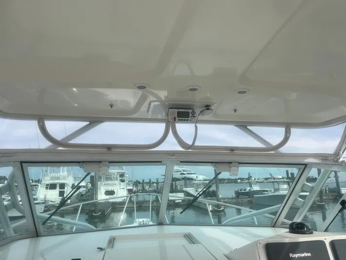  Yacht Photos Pics 2008 Rampage 30 Express boat interior view at marina.