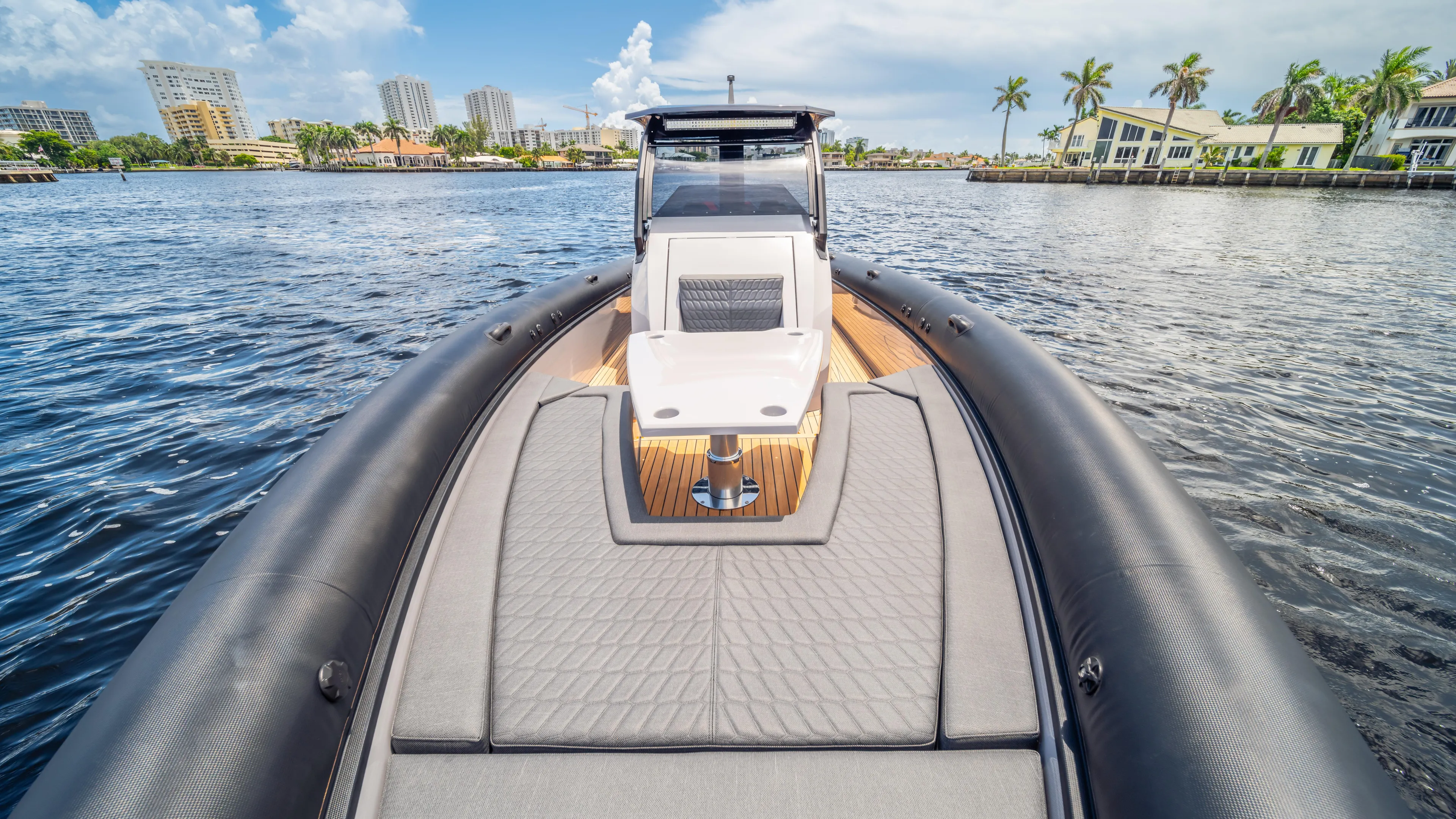 Skipper 38 Twin Mercury 400 V10 Verado Yacht Photos Pics 2025 Skipper-BSK 38 boat on water, featuring sleek design and spacious deck.