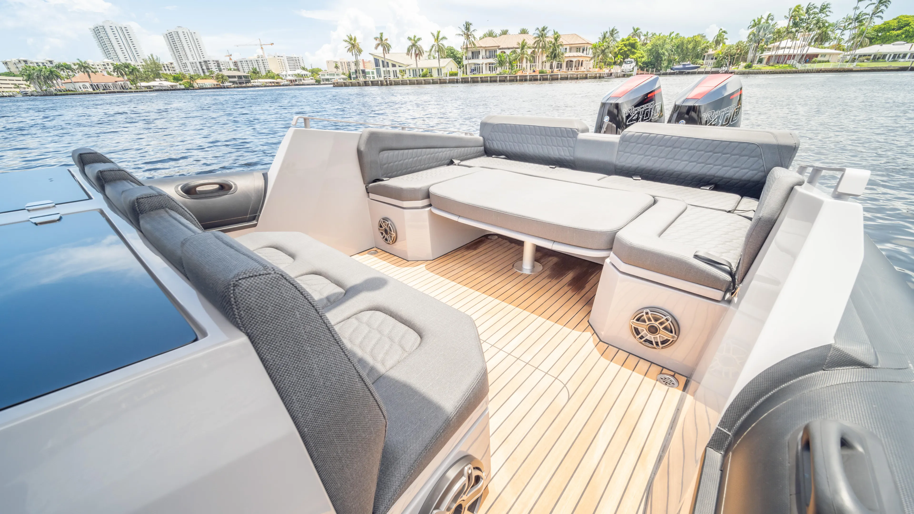 Skipper 38 Twin Mercury 400 V10 Verado Yacht Photos Pics Luxurious 2025 Skipper-BSK 38 boat interior with spacious seating and scenic waterfront view.